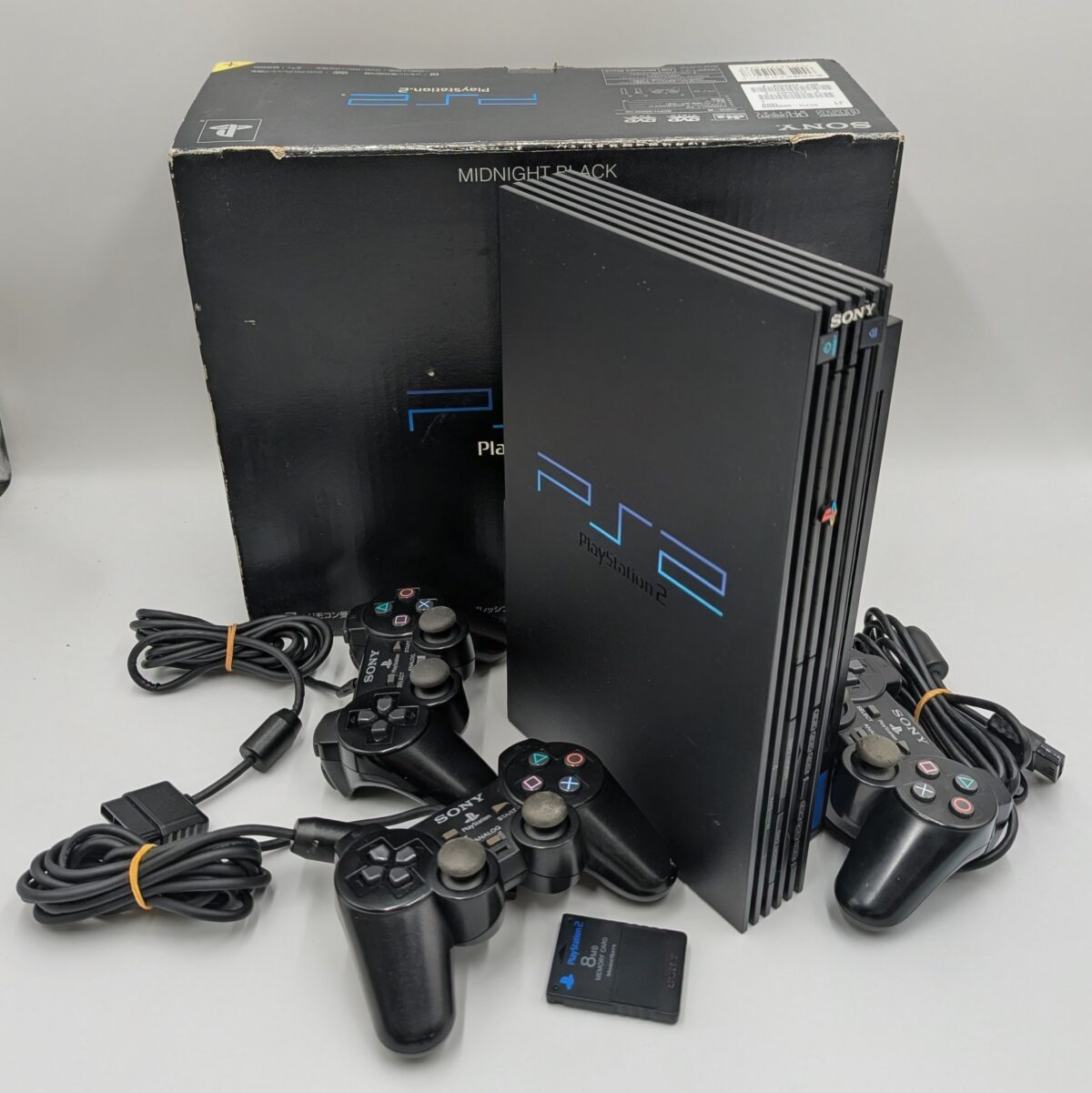 Boxed Refurbished PlayStation 2 Midnight Black (Region Modded)